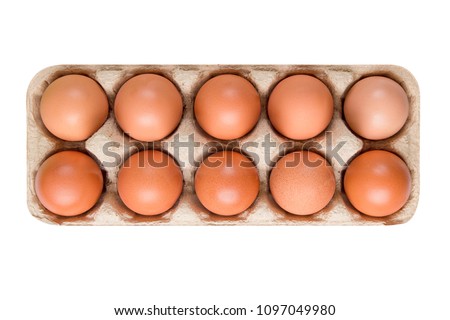 packing; box of brown; beige eggs isolated on white background; top view; 10 pieces