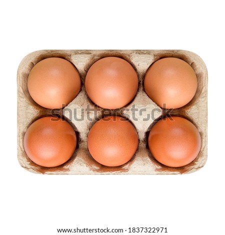 Packing, box of brown, beige eggs isolated on white background. top view, 6 pieces.