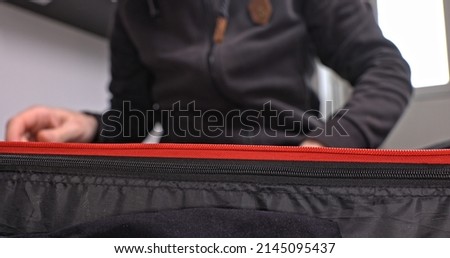 Packing and checking luggage view from inside