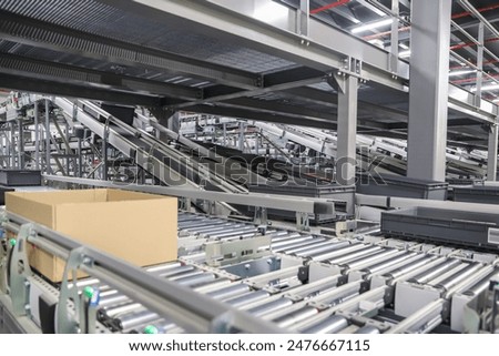 Modern machine for packaging line in factory workshop