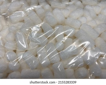 Packing Popcorn In A Shinny Plastic Bag At Shopping And Packing Store