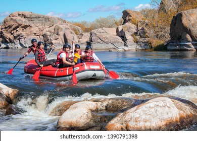 Pacuare River,  Costa Rica - March 14 2019: Rafting Team , Summer Extreme Water Sport.  Group Of People In A Rafting Boat, Beautiful Adrenaline Ride Down The River.