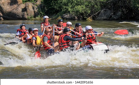 Pacuare River,  Costa Rica - March 14 2019: Rafting Team , Summer Extreme Water Sport.  Group Of People In A Rafting Boat, Beautiful Adrenaline Ride Down The River.