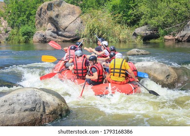 Pacuare River,  Costa Rica - March 14 2019: Rafting Team , Summer Extreme Water Sport.  Group Of People In A Rafting Boat, Beautiful Adrenaline Ride Down The River.