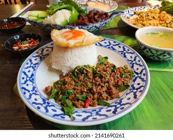 Pad Gaprao (Pad Kra Pao) Holy Basil Chicken Stir Fry. Phat kaphrao consists of meat such as pork, chicken, beef, and seafood stir fried with Thai holy basil and garlic.
