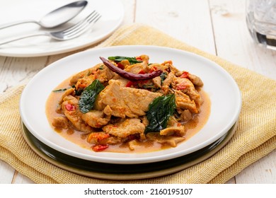 Pad kra pao gai, chicken stir-fried with chili, garlic and holy basil leaves to create this hot-spicy delicious dish. It is a popular simple Thai menu served from street food carts to restaurants.