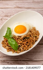 Pad Krapow Basil And Minced Meat Stir Fry Served With Rice
