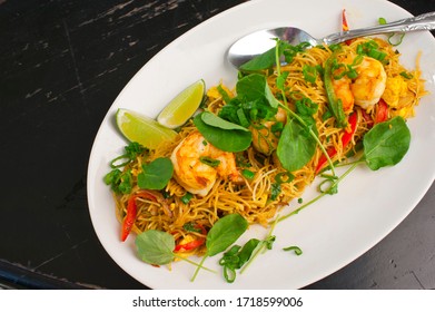 Pad Thai. Classic Thai Or Vietnamese Restaurnt Takeout Favorite. Broad Noodles, Mixed With Sauces, Tofu, Onions, Peanuts, Bean Sprouts And Garlic.