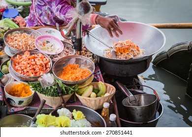 Pad Thai cooking on the boat in Amphawa floating market