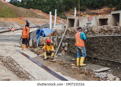 Padang, Indonesia - January 27, 2021: Construction Workers Working On Road Construction In A Government Building Construction Area.