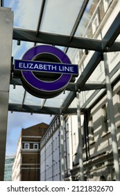 PADDINGTON, LONDON - FEBRUARY 11, 2022: Elizabeth line sign outside the station entrance before opening to the public later in the year at Paddington in London, UK.