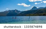 Paddle boarding on Redfish Lake in the Sawtooth Mountains in Idaho