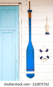 Paddle Boats Made Of Wood On Wall.