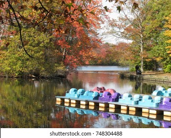 Paddle Boats On An Autumn Day On Belmont Lake In Babylon, Long Island, New York