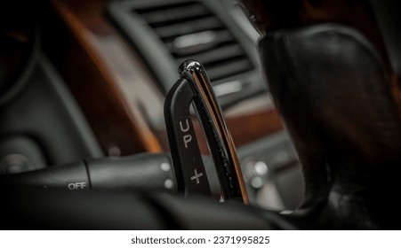 Paddle shifter on a car steering wheel