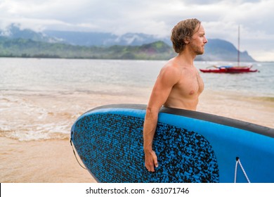 Paddleboard Man Going Paddleboarding On Hawaii Ocean Beach. Stand Up Paddle Boarding In Hawaiian Island Summer.