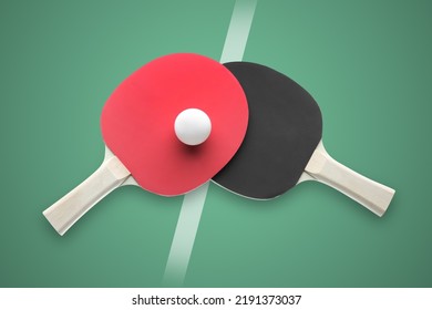 Paddles And Ball On Green Ping Pong Table, Top View