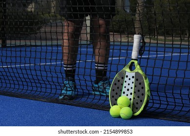 Padel is a racket sport and typically played in doubles on an enclosed court roughly 25% smaller than the size of a tennis court.