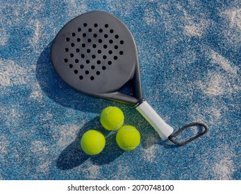 padel tennis racket sport court and balls
				