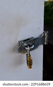 A padlock attached to a door or fence, photo taken in a town called montreux, april 19, 2023, switzerland. - Shutterstock ID 2291688639