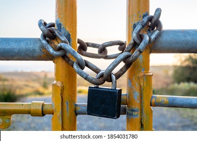 Padlock and chain at gate in wild Ireland.