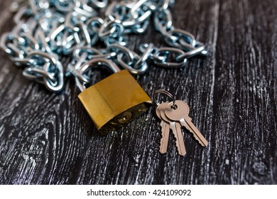 Padlock isolated on grey table