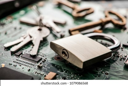 Padlock on computer circuit board.Security concept
