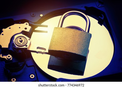 Padlock on computer hard disk drive HDD. Internet data privacy information security concept