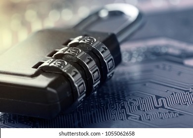 Padlock on computer motherboard. Internet data privacy information security concept.