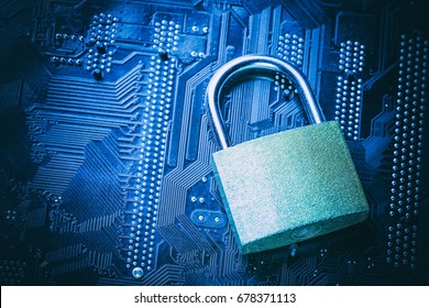 Padlock on computer motherboard. Internet data privacy information security concept. Cyber crime concept.