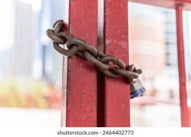Padlocks with chains used to secure a building