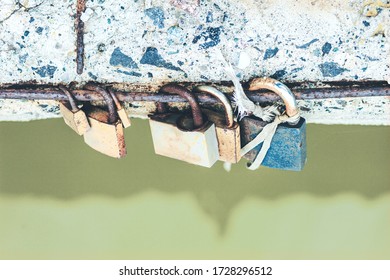 Lot of padlocks hanging on bridge. Concept represent forever love