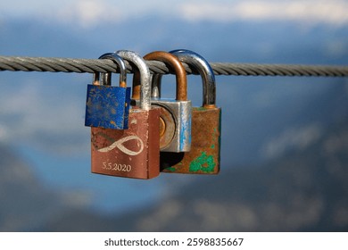Padlocks, sometimes engraved with the names or initials of love-struck couples, representing eternal love