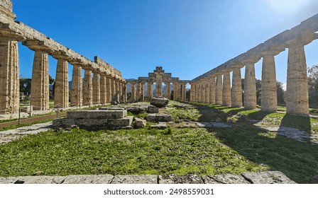 Paestum, Italy - the ruins of Paestum are famous for their three ancient Greek temples in the Doric order dating from about 550 to 450 BC, with the city walls and amphitheatre are largely intact - Powered by Shutterstock