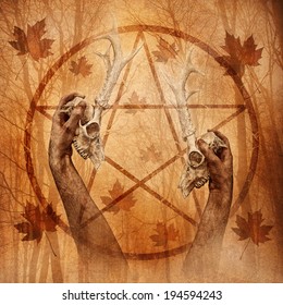 Pagan Ritual Graphic With Hands Upholding Two Stag Skulls Against A Forest Background Overlaid With A Pentagram.