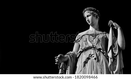 Paganism in Ancient Times. Roman or Greek goddess neoclassical marble statue, erected in the 19th century in Rome hoistoric center (Black and White with copy space)