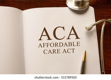 Page With ACA (Affordable Care Act) On The Table With Stethoscope, Medical Concept