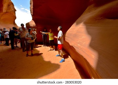 PAGE, AZ - MAY 26: Upper Antelope Canyon Tour On May 26, 2015 In Page AZ,USA. Thousands Of People From All Over The World Come To Visit Upper Antelope Canyon