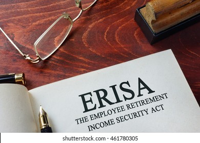 Page With ERISA The Employee Retirement Income Security Act Of 1974  On A Table.