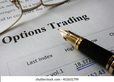 Page of newspaper with words options trading.