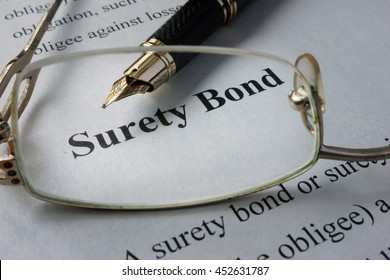 Page Of Newspaper With Words Surety Bond. 