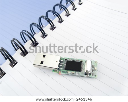 Page of a notebook with compactflash for storage of the information