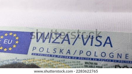 Page of Passport with Polish multi Schengen Visa. Selective focus
