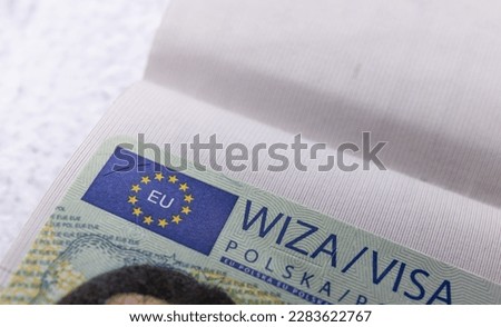 Page of Passport with Polish multi Schengen Visa. Selective focus
