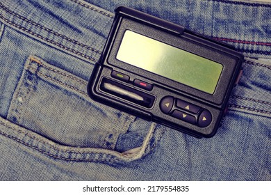 Pager is an old retro gadget for communication on jeans