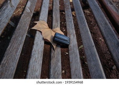 Pager, Old Vintage Beeper. The Pager Lies On A Park Bench