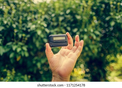 Pagers, Old Vintage Beeper, Pager In Hand