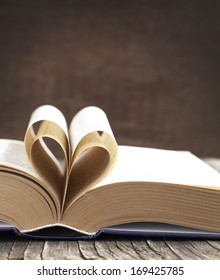 Pages Of A Book Curved Into A Heart Shape