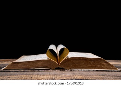 Pages Of A Book Curved Into A Heart Shape. 