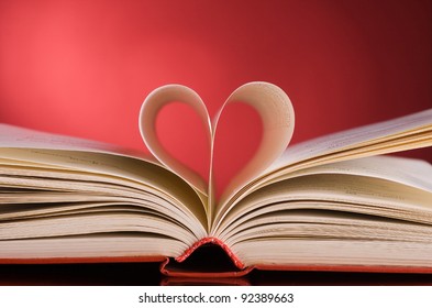 Pages Of A Book Curved Into A Heart Shape